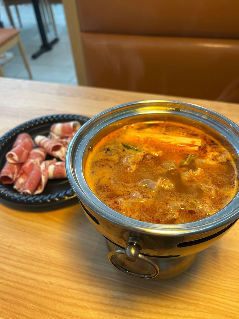 Bubbling Broth At The Table