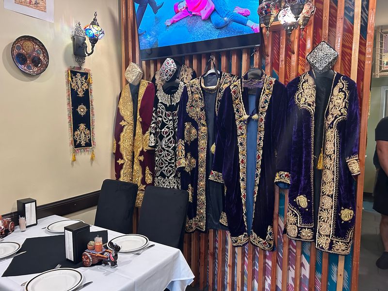 Colorful Decor Makes The Dining Room Feel Like Someone's Home
