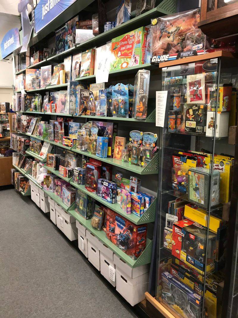 Comics, Records, and Toys Stacked to the Ceiling