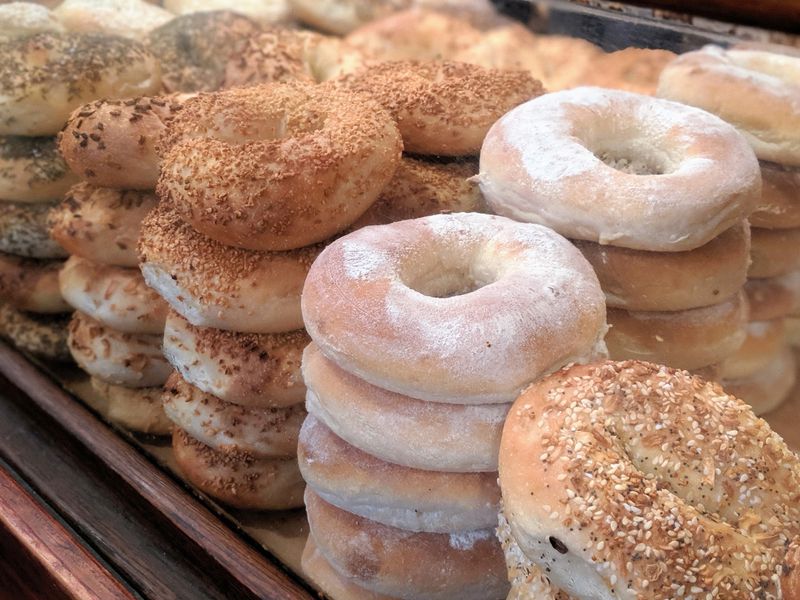 Every Bagel Takes A Hot Bath Before The Oven