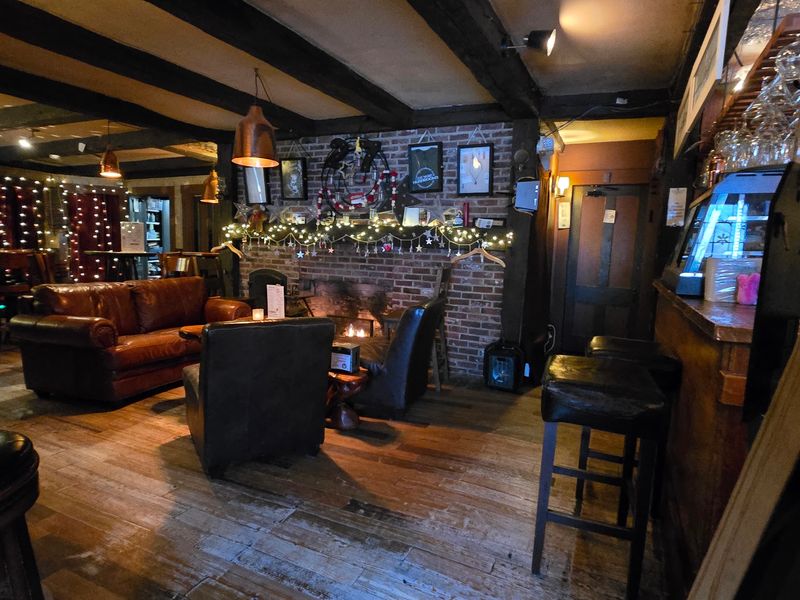 Fireplace Glow and Timber Beams