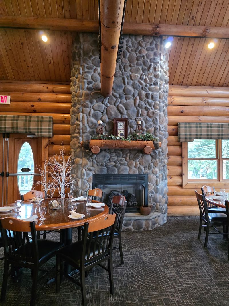 Fireplaces, Wood Beams, and a Room That Hugs Back Fireplaces, Wood Beams, and a Room That Hugs Back