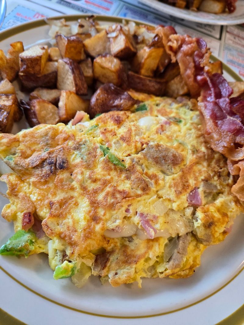 Four Eggs Is Just The Warm-Up For This Omelet Four Eggs Is Just The Warm-Up For This Omelet