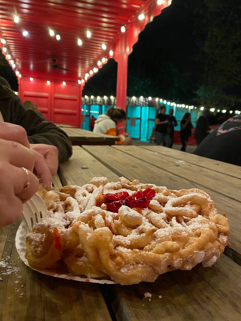 Funnel Cakes, Fire Pits, and Friendly Monsters on the Midway Funnel Cakes, Fire Pits, and Friendly Monsters on the Midway
