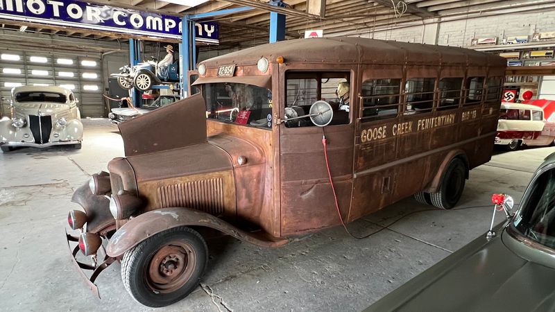 Gleaming Classic Cars and a Prison Bus