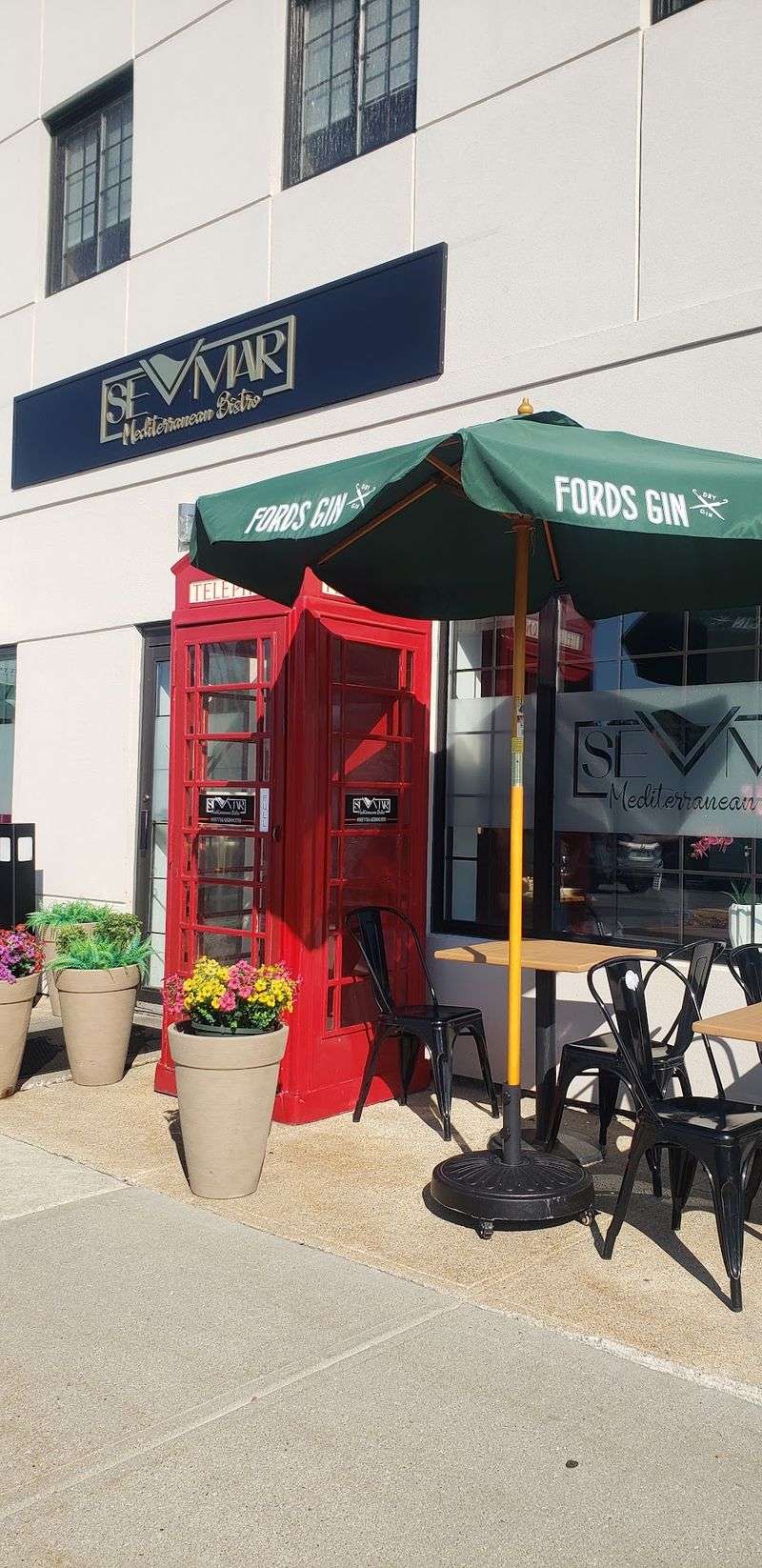 Look For The Bright Red Phone Booth By The Door Look For The Bright Red Phone Booth By The Door