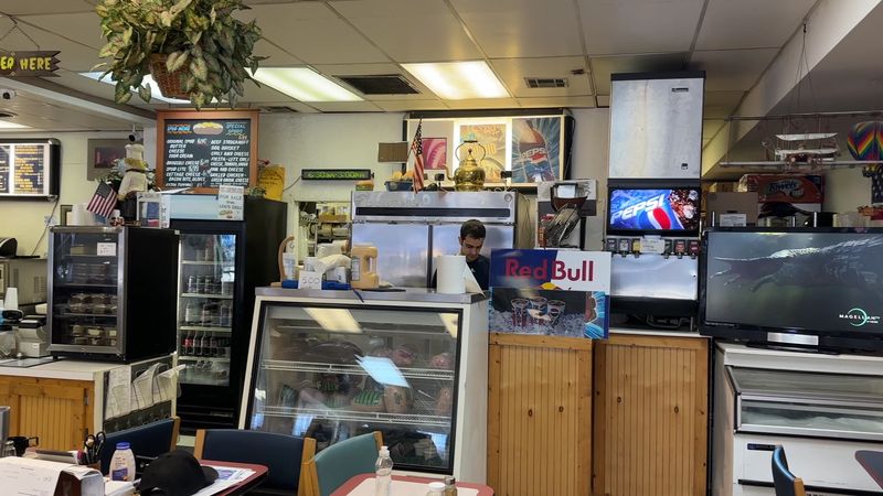 Lou Behind the Counter