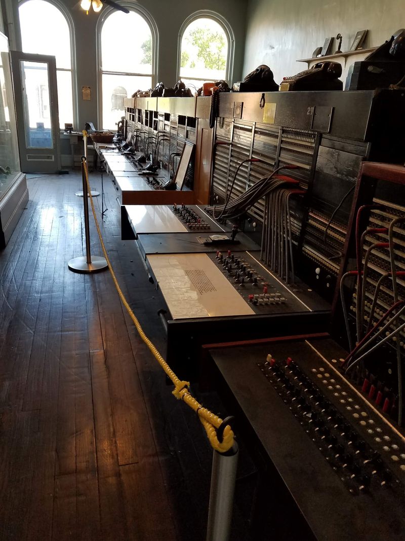 Old Phones And Switchboards Inside A Former Bank