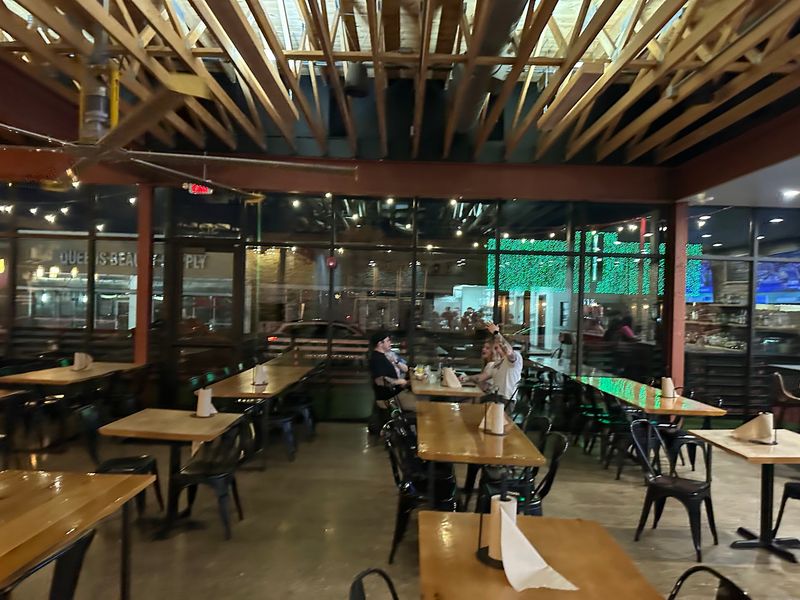 Open Kitchen, Rooftop Seats, and a Relaxed Crowd Open Kitchen, Rooftop Seats, and a Relaxed Crowd