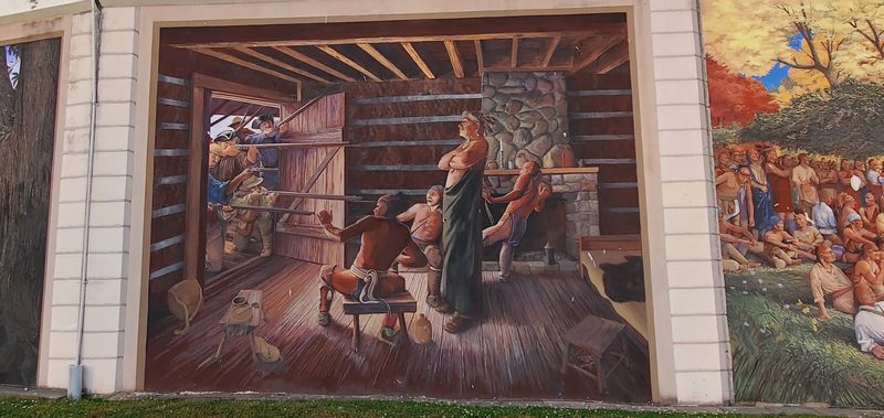 Painted History Stretches Along The Floodwall