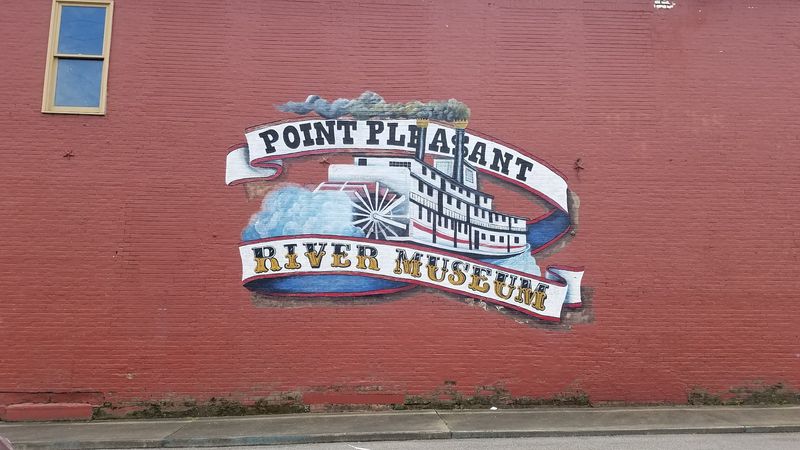 Painted Murals Along the River Wall Painted Murals Along the River Wall