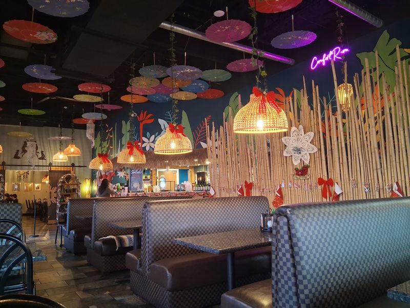 Parasols, Bamboo, And A Bahay Kubo Mural