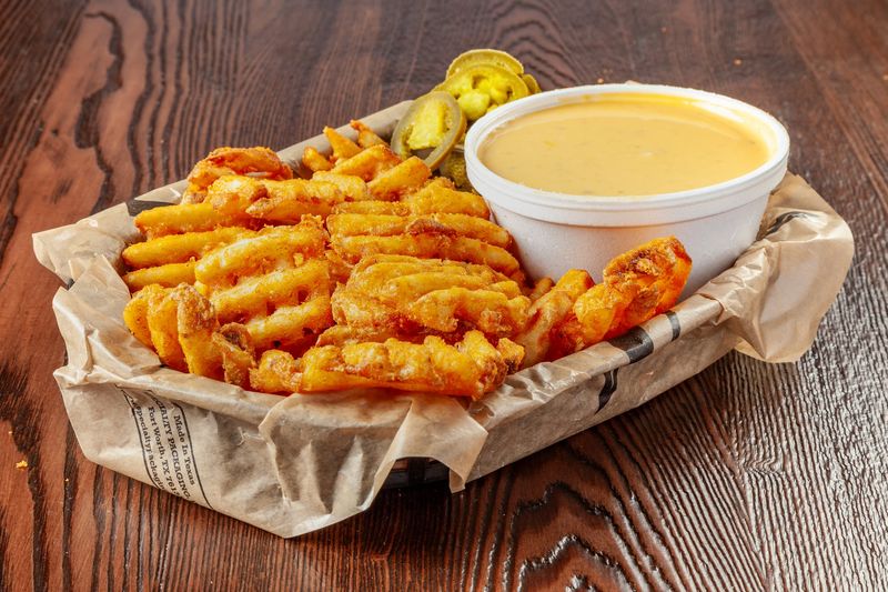 Queso, Waffle Fries, and Egg Rolls