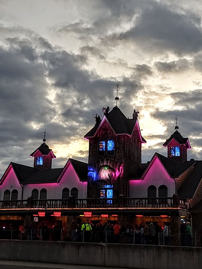 Several Haunted Houses Wait Beyond the Trees