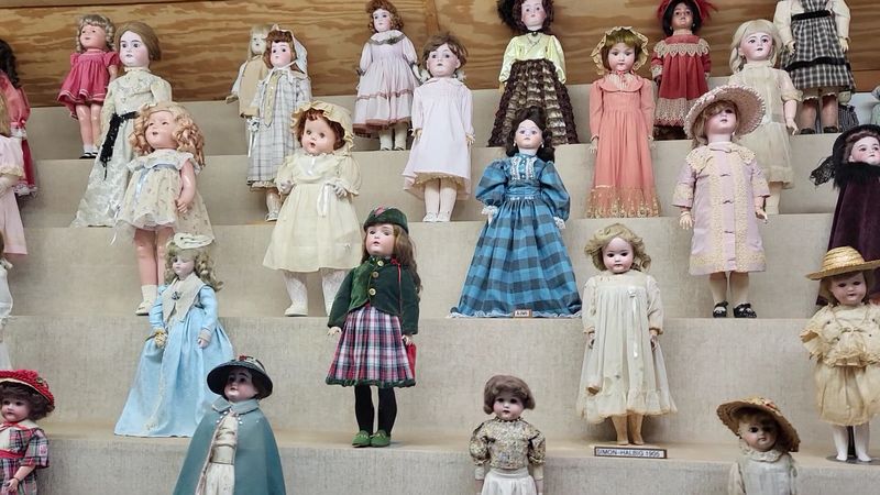 Shelves of Dolls, Spoons, Marbles, and More
