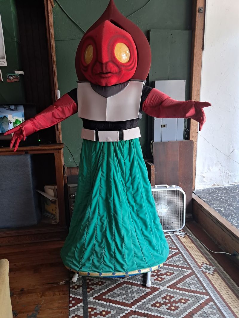 Spade-Shaped Hood, Glowing Eyes, and Claw-Like Hands