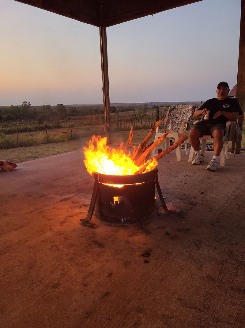 Steak, Baked Potato and Salad by Firelight
