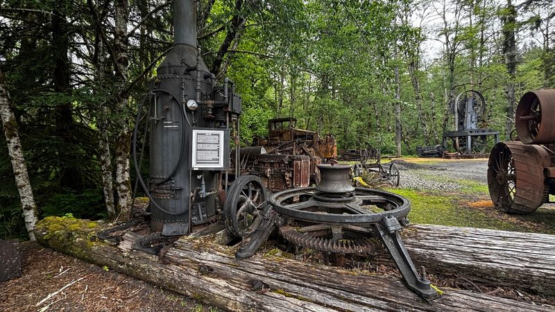 Steam Donkeys And A Red Caboose Wait Outside For Free