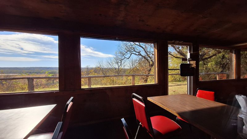 Sunroom Seats Above the Red River Sunroom Seats Above the Red River