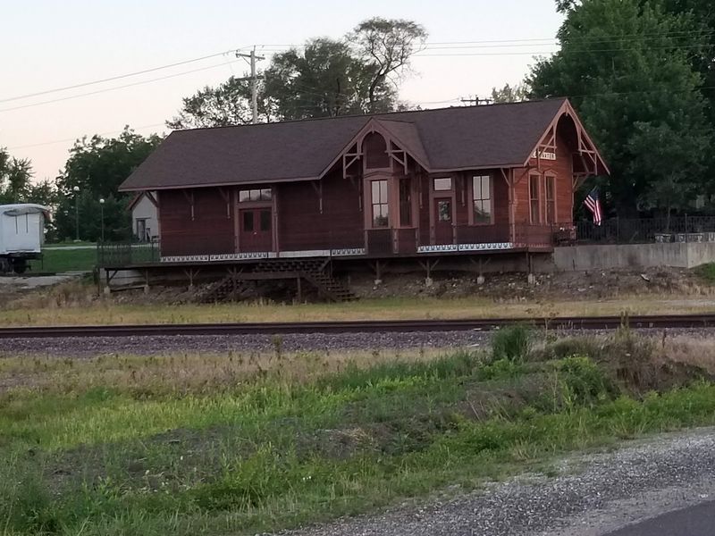 That Rebuilt Depot With A Caboose Out Front