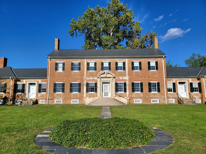 The Brick Mansion Behind Pan Is Older Than The Country