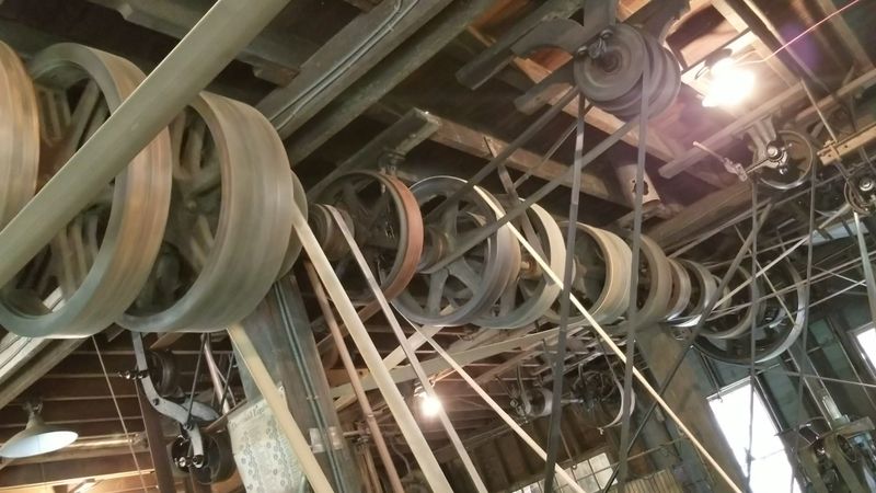 The Spinning Ceiling of Belts and Pulleys