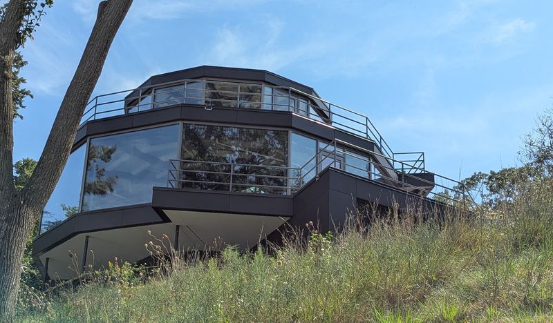 The Twelve-Sided Glass House Came With a Hangar The Twelve-Sided Glass House Came With a Hangar