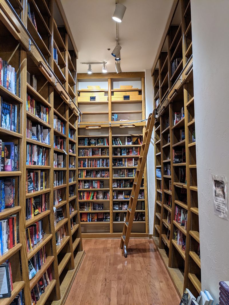 Thirteen-Foot Oak Shelves With Rolling Ladders Thirteen-Foot Oak Shelves With Rolling Ladders