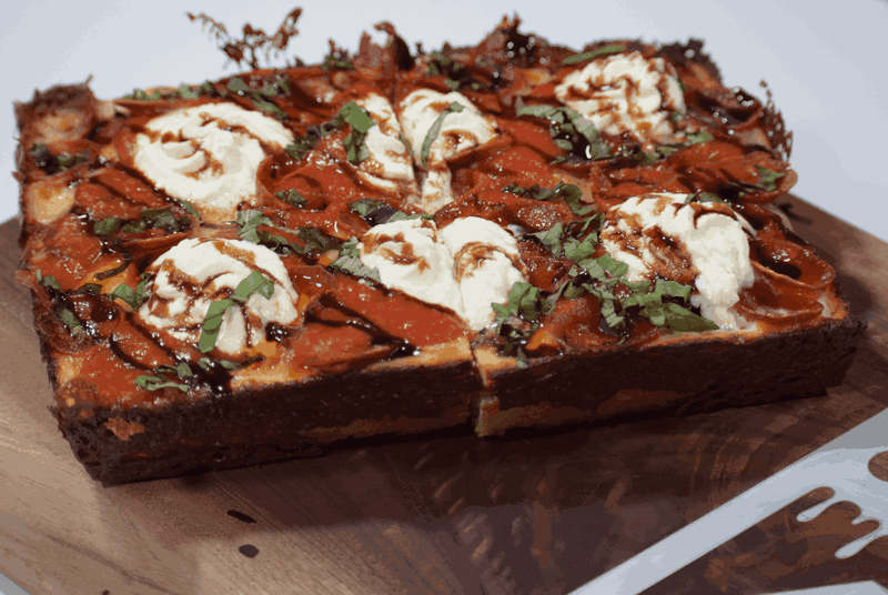 Those Crispy Cheese Edges Are The Whole Reason To Fight Over Corners
