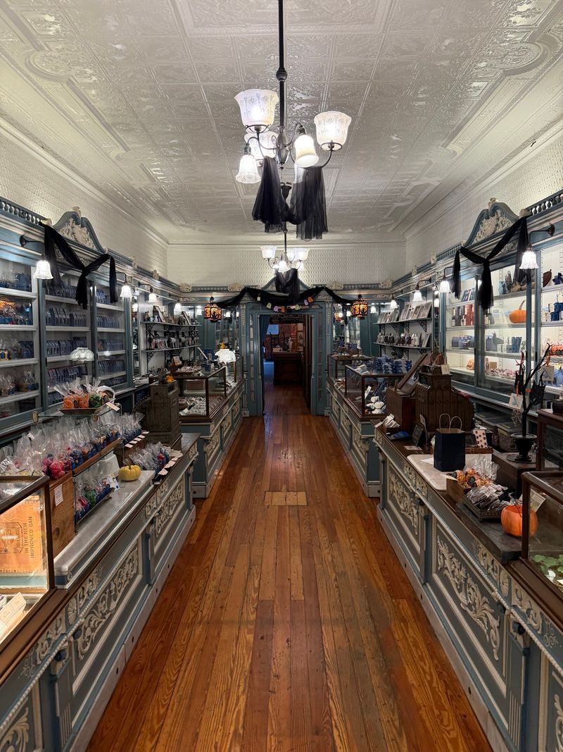 Tin Ceilings, Glass Cases, and a Brass Register Tin Ceilings, Glass Cases, and a Brass Register