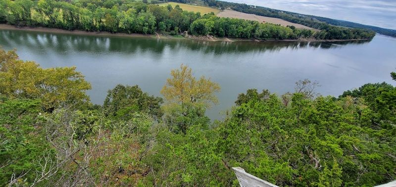 Two Boardwalks Hang Over The River Like Front-Row Seats