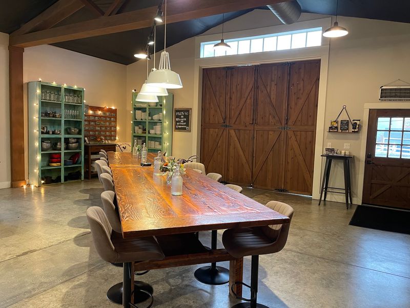Wood Beams And Big Doors Make This Classroom Glow