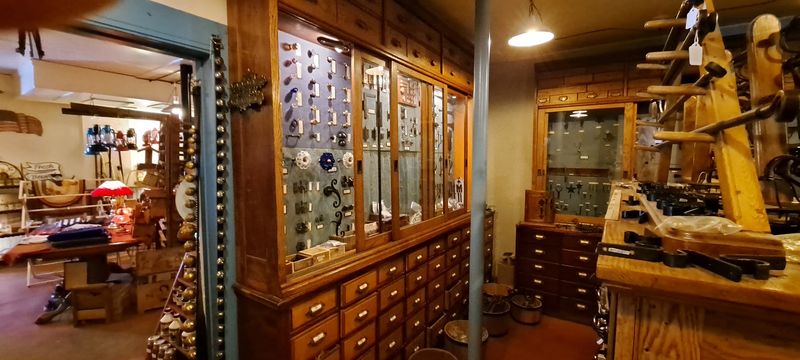 Wrought Iron Hooks, Hinges, and Antique Drawers